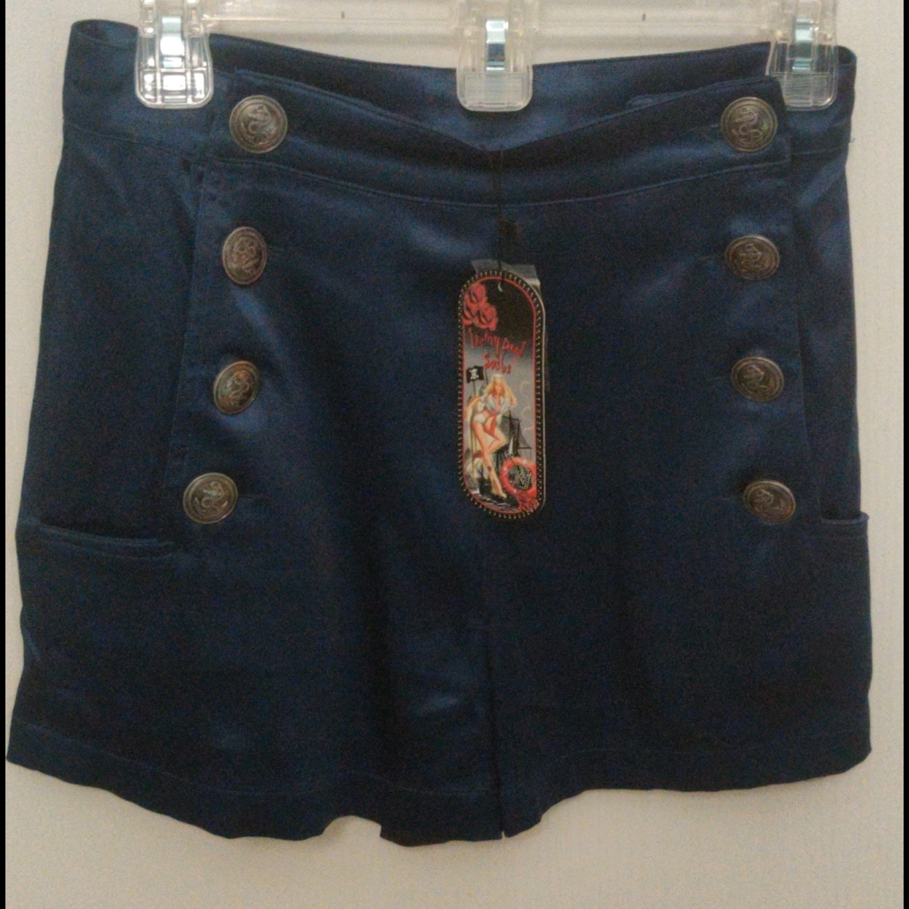 Blue satin high-waisted shorts with anchor buttons